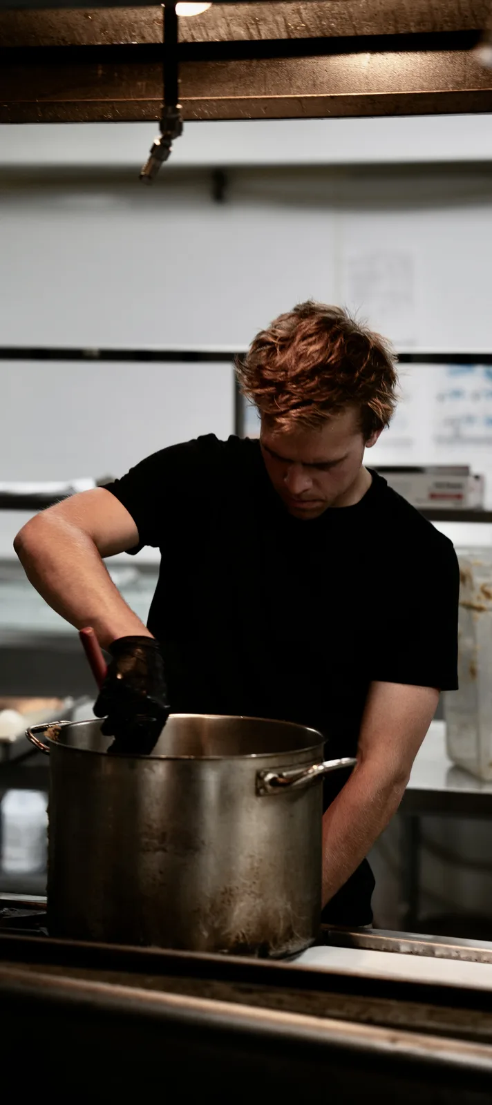 Carson cooking a big batch in the kitchen